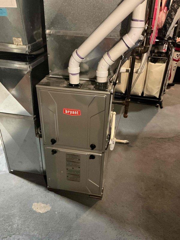 Responded to service call for Bryant furnace with leaking humidifier making noise. Inspected system components including circuit board (CER:130948-02) and exhaust venting. Diagnosed and repaired faulty humidifier connection to resolve water leakage and eliminate operational noise while maintaining proper heating functionality.