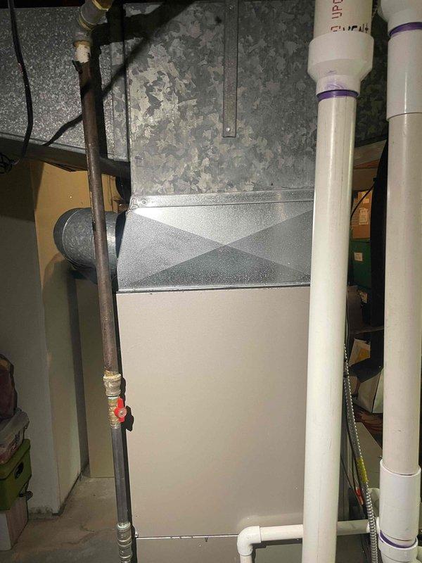 Performed diagnostic assessment on 13-year-old non-operational furnace located in basement. System exhibited zero activity when calling for heat. Visual inspection of the unit revealed potential issues with the ignition system and possible control board malfunction that will require replacement of components to restore heating functionality.