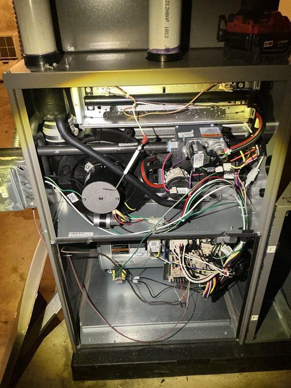 Performed routine furnace maintenance including full system inspection and filter replacement. Accessed internal components to inspect blower motor assembly, electrical connections, and control boards, confirming all systems operating within normal parameters. Equipment is functioning properly with no issues identified during the tune-up service.