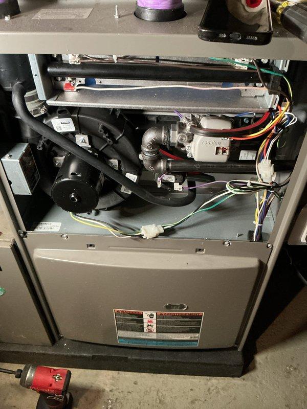 Performed scheduled ComfortGuard 5-Year Maintenance Package on residential gas furnace system. Completed comprehensive inspection of internal components including draft inducer motor, pressure switch, gas valve assembly, control board, and electrical connections. Cleaned interior components using specialized filter equipment to ensure optimal system performance and efficiency.