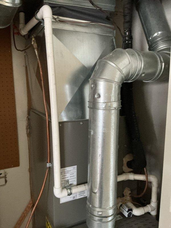 Completed standard heating maintenance on a Lennox furnace system. Inspected all components including ductwork, PVC venting, refrigerant lines, and condensate drainage system. Unit is functioning properly with no visible issues or required repairs.