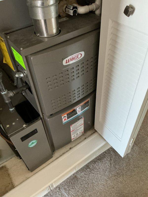 Completed standard heating maintenance on a Lennox furnace system. Inspected all components including ductwork, PVC venting, refrigerant lines, and condensate drainage system. Unit is functioning properly with no visible issues or required repairs.