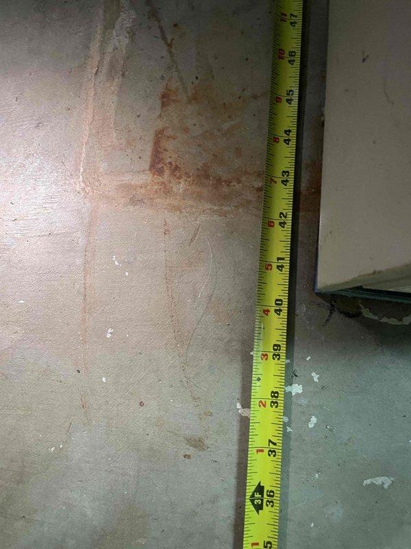 Conducted measurement assessment for replacement of 25+ year old furnace and A/C system located in basement. Unit is currently operational but at end of serviceable lifespan. Measurements taken of installation area included vertical clearances (approximately 46") and floor space dimensions to ensure proper sizing for new equipment.