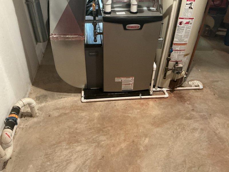 Successfully installed a new 90,000 BTU Lennox furnace in the customer's basement utility room, replacing the existing unit. Completed all necessary mechanical connections, including proper PVC drainage piping and connection to the existing ductwork system, ensuring the system was fully operational before departure.