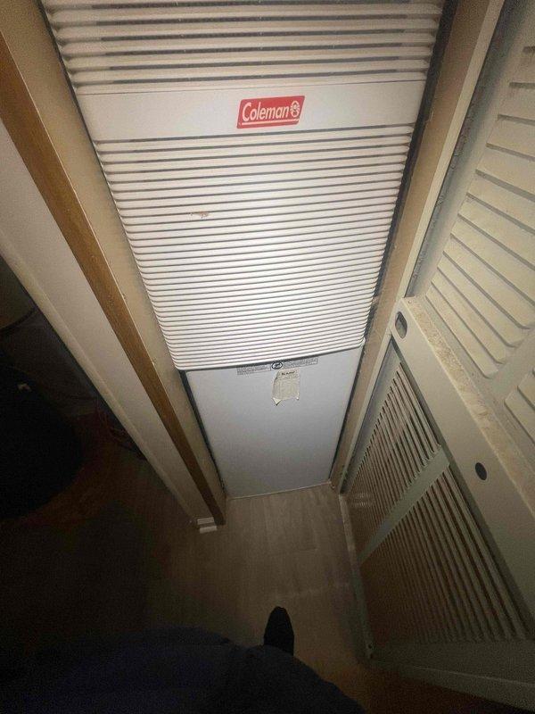 Conducted a free estimate for installation of a new cooling system in a residential property with no existing AC. Customer's home has a narrow utility closet that could accommodate a Coleman HVAC unit. Noted water damage on interior wall beneath window near electrical outlet that will need to be addressed prior to installation.