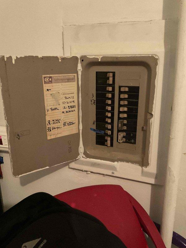 Conducted inspection of electrical service panel for CQ Quote 126488-01 A/C Only - Home Show. Documented current circuit breaker configuration and noted panel condition with visible unfinished drywall work around the installation. Photographic documentation completed for proper electrical capacity assessment prior to air conditioning system replacement.