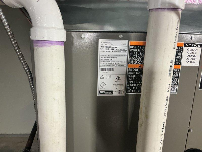# HVAC Install - Complete System

## Summary
Successfully completed full HVAC system replacement including installation of 110,000 BTU furnace and 4-ton air conditioning unit with left-side configuration, humidifier integration, and reconnection of all existing utilities.

## Work Performed

Removed existing HVAC equipment and installed new Lennox furnace system with 110,000 BTU heating capacity in basement mechanical room. Mounted furnace cabinet on concrete floor with proper clearances and secured unit to manufacturer specifications.

Installed 4-ton air conditioning system with left-side refrigerant line configuration to match existing infrastructure. Connected air handler plenum to furnace discharge and secured all ductwork connections with appropriate sealing methods. Installed silver-insulated rectangular plenum above furnace unit and connected black flexible ductwork for proper air distribution.

Integrated humidifier system into new furnace installation, connecting water supply