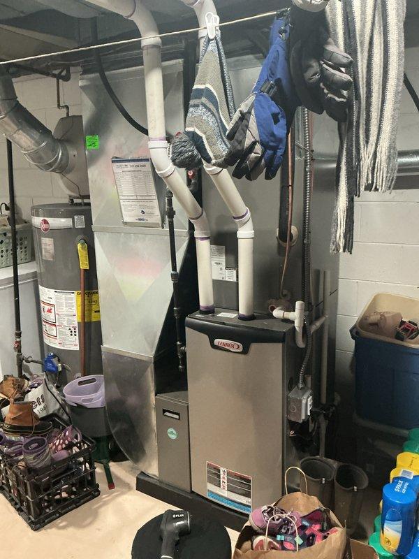 # HVAC Maintenance - ACM Service Summary

Completed annual cooling maintenance on Lennox HVAC system. Performed comprehensive inspection of evaporator coil assembly, verified proper refrigerant line connections and insulation integrity, and checked condensate drain lines for proper operation. All components found to be in satisfactory working condition with system operating within normal parameters.

---

## Detailed Service Report

Performed annual cooling maintenance (ACM) on residential Lennox HVAC system located in mechanical room. Conducted thorough inspection of air handler unit and evaporator coil assembly. Examined multi-row serpentine evaporator coil configuration, verifying clean coil surfaces and proper airflow through heat exchanger. Inspected metal housing and internal framework for structural integrity and signs of corrosion or deterioration.

Evaluated refrigerant line connections, including insulated copper suction line with characteristic orange insulation and liquid l
