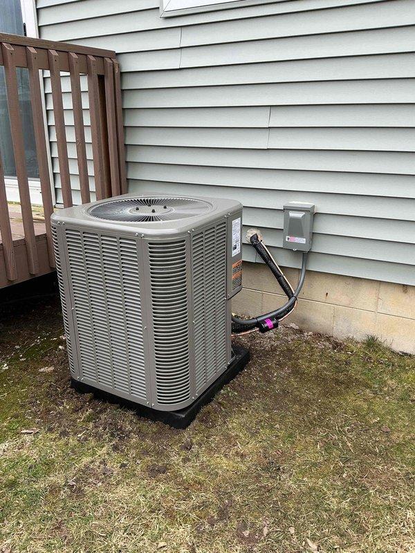 Completed full HVAC system installation including 70,000 BTU furnace with humidifier reconnection in basement mechanical room and matching outdoor air conditioning condenser unit with proper electrical disconnect. All equipment installed per manufacturer specifications, permits obtained, utility company notifications processed, and system tested for proper operation.