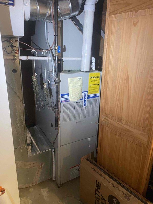 Completed HVAC estimate for air conditioning replacement in basement installation. Assessed non-operational existing system and documented current equipment configuration including furnace, ductwork, electrical service panel with 150-amp main breaker, and associated mechanical components. Provided comprehensive replacement quote for new AC system compatible with existing infrastructure and electrical capacity.