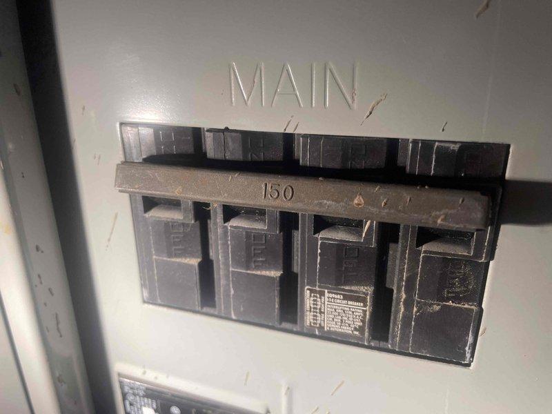Completed HVAC estimate for air conditioning replacement in basement installation. Assessed non-operational existing system and documented current equipment configuration including furnace, ductwork, electrical service panel with 150-amp main breaker, and associated mechanical components. Provided comprehensive replacement quote for new AC system compatible with existing infrastructure and electrical capacity.