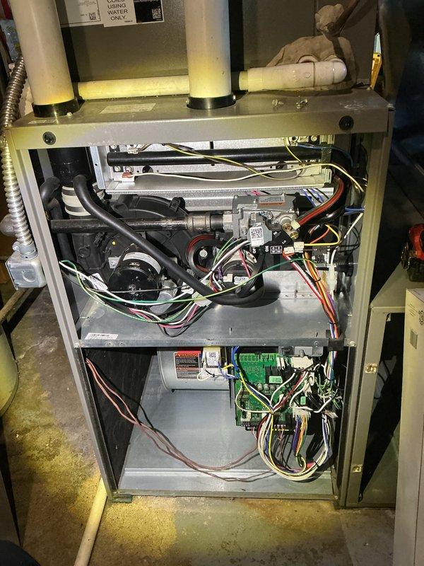 # HVAC Maintenance - Annual Heating Maintenance

Completed annual heating maintenance service on residential forced air furnace system. Performed comprehensive inspection of gas furnace unit including all internal components, electrical connections, and safety controls.

Removed and replaced heavily soiled pleated air filter which showed significant dust and debris accumulation. Old filter displayed darkened, discolored pleats indicating restricted airflow and reduced system efficiency. Installed new filter with proper specifications to restore optimal air circulation and indoor air quality.

Conducted thorough visual inspection of furnace interior components including blower motor assembly, gas valve, heat exchanger, control board, and all electrical wiring connections. Verified proper operation of ignition system and flame sensor. Inspected condition of burner assembly and combustion chamber. Checked all wire connections to control board and safety switches for secure attachment and 