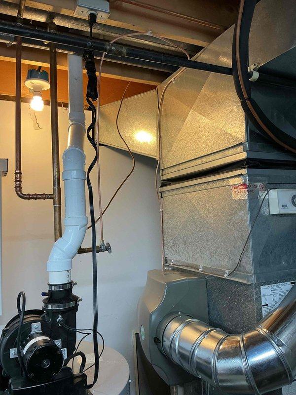 Successfully installed a 17-gallon whole-home humidifier system integrated with the existing HVAC ductwork. Installation included mounting the humidifier unit, connecting water supply lines via PVC piping, establishing electrical connections, and integrating the system with the furnace plenum for proper humidity distribution throughout the home.