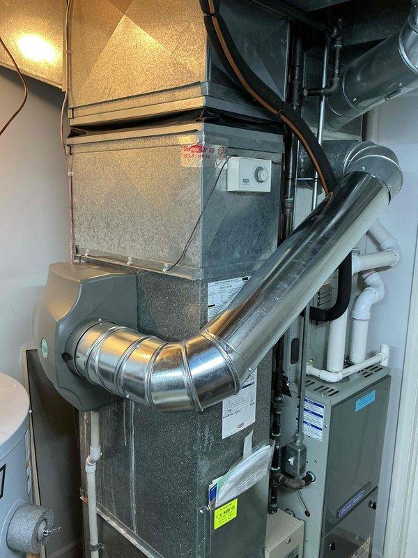 Successfully installed a 17-gallon whole-home humidifier system integrated with the existing HVAC ductwork. Installation included mounting the humidifier unit, connecting water supply lines via PVC piping, establishing electrical connections, and integrating the system with the furnace plenum for proper humidity distribution throughout the home.