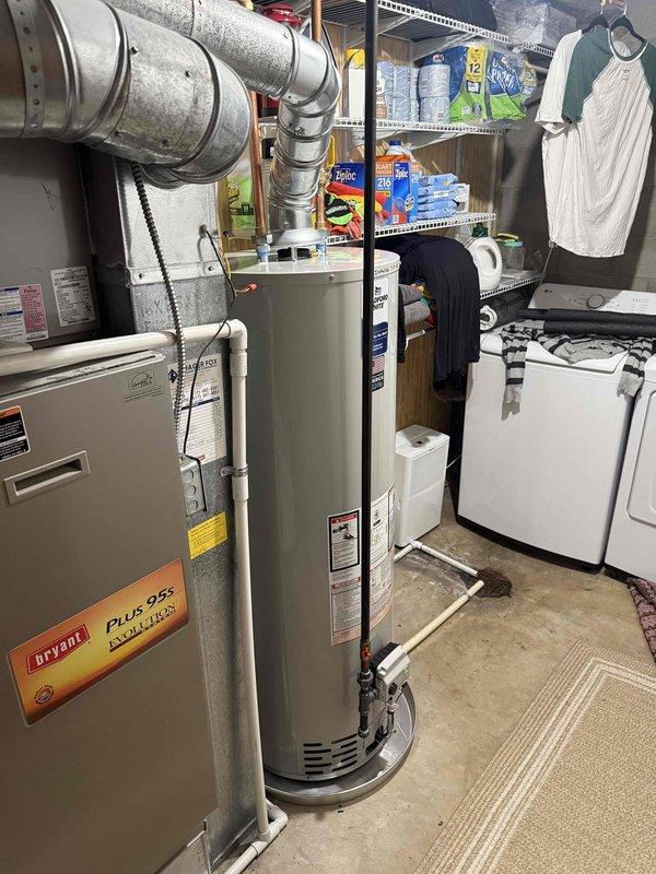 Successfully completed installation of a 40-gallon tanked water heater in residential basement utility area. Removed existing unit and installed new water heater with proper piping connections, venting system, and safety compliance features. Obtained necessary mechanical permits prior to installation and ensured all work met code requirements for hot water heater reconnection and operation.