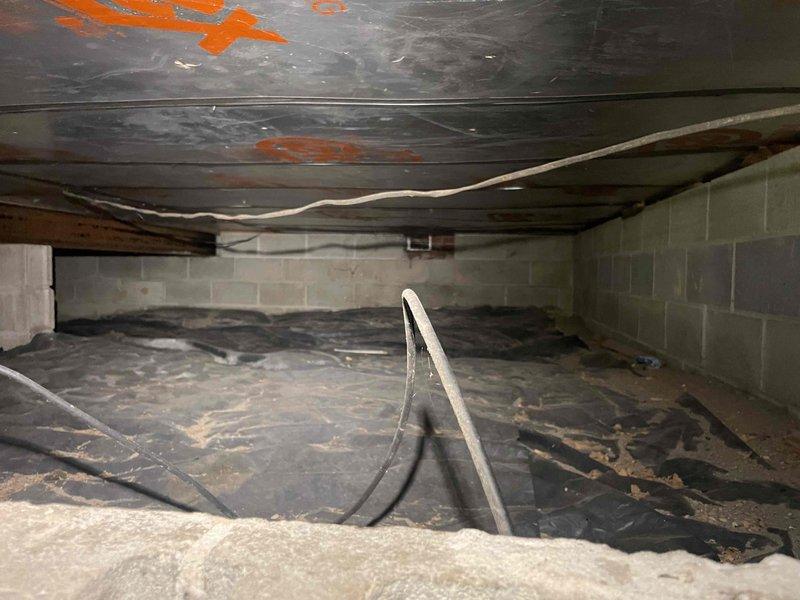 Conducted on-site evaluation for customer requesting estimate to convert existing propane boiler system to forced air heating with central air conditioning, as well as separate pricing for air conditioning installation only. Inspected current 2-4 year old propane boiler system located in basement. Assessed electrical panel capacity and existing infrastructure to determine feasibility of forced air conversion and A/C integration. Evaluated crawlspace conditions and vapor barrier installation for potential ductwork routing and equipment placement requirements.