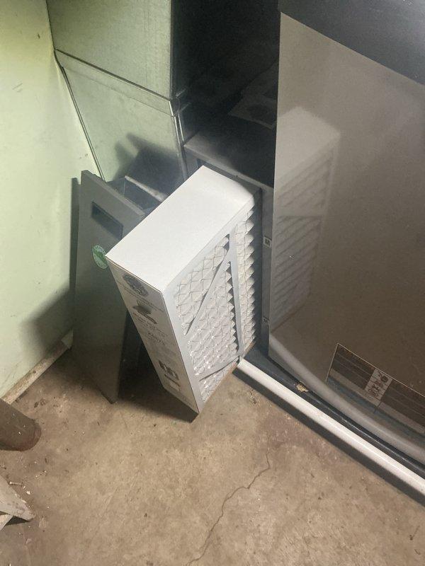 Completed annual cooling maintenance on residential HVAC system. Replaced air filter and discovered significant frost buildup on evaporator coil and interior components, indicating potential refrigerant restriction, airflow deficiency, or system malfunction requiring further diagnostic evaluation and repair.