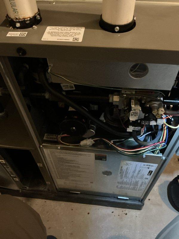 Completed scheduled HVAC maintenance on air handling unit including filter replacement and evaporator pad service as part of ongoing cooling and heating system maintenance program. Inspected internal mechanical components, electrical connections, blower assembly, and refrigerant lines; all systems found operating within normal parameters with proper wire terminations and secure mounting hardware.