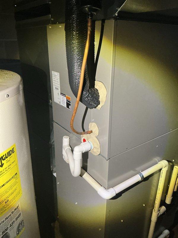 Completed comprehensive ComfortGuard maintenance visit on residential HVAC system, including thorough inspection of air handler unit, ductwork connections, and drainage systems. Replaced humidifier pad as requested during pre-service call, verified proper operation of all electrical connections, condensate drain trap functionality, and filter condition. All system components found to be operating within normal parameters with no additional repairs required at this time.