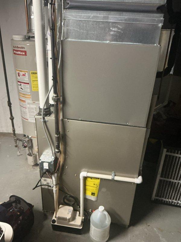 Completed scheduled air handler maintenance on residential HVAC system. Performed comprehensive inspection of vertical air handler unit, checked all electrical connections, verified proper operation of condensate pump and drainage system, inspected return air filter grille, and confirmed all mechanical components functioning within normal parameters.