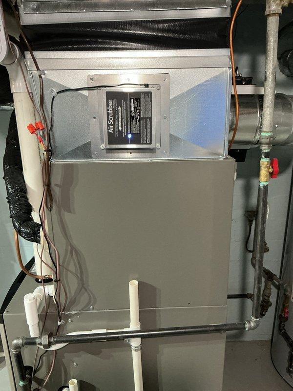 Completed comprehensive ComfortGuard maintenance visit on residential HVAC system including air handler unit and associated mechanical equipment. Performed standard inspection protocols on all accessible components, verified proper operation of condensate drain lines, checked electrical connections and refrigerant line integrity, and inspected ductwork and filtration system. All equipment found in operational condition with organized connections and clean surfaces maintained throughout the mechanical room installation.