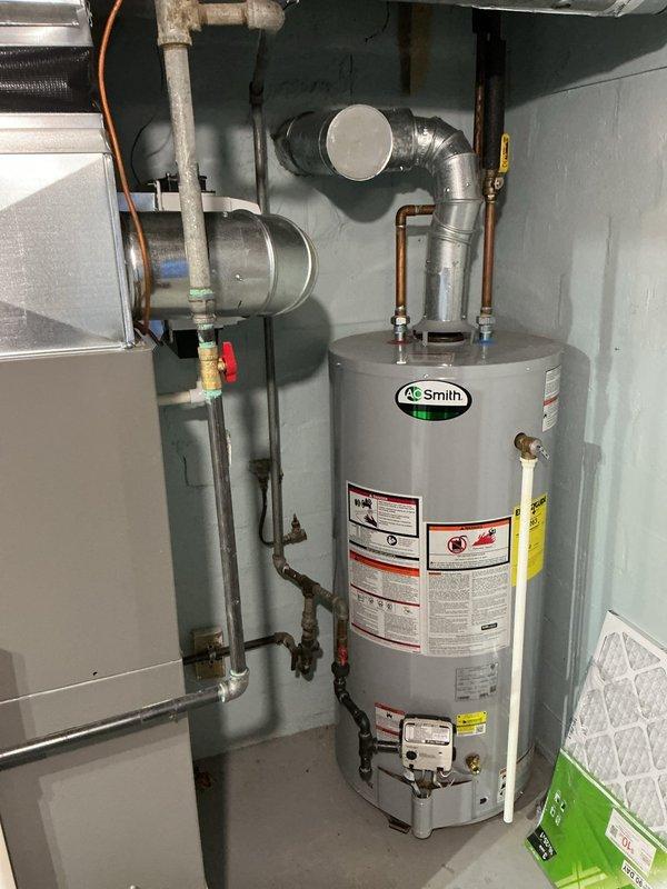 Completed comprehensive ComfortGuard maintenance visit on residential HVAC system including air handler unit and associated mechanical equipment. Performed standard inspection protocols on all accessible components, verified proper operation of condensate drain lines, checked electrical connections and refrigerant line integrity, and inspected ductwork and filtration system. All equipment found in operational condition with organized connections and clean surfaces maintained throughout the mechanical room installation.