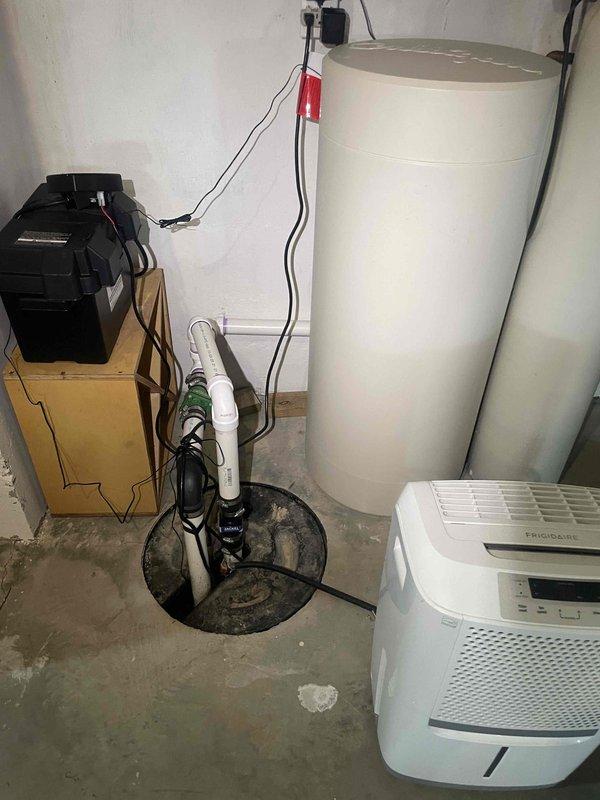 Conducted on-site assessment for whole house Kohler generator installation. Evaluated existing electrical service entrance, metering equipment, and main panel location on exterior wall. Inspected basement utility area to assess electrical distribution system, identifying water heater and sump pump loads for transfer switch sizing calculations. Documented site conditions including available clearances near electrical meter for generator placement, existing conduit routing, and utility room configuration to develop comprehensive installation estimate.