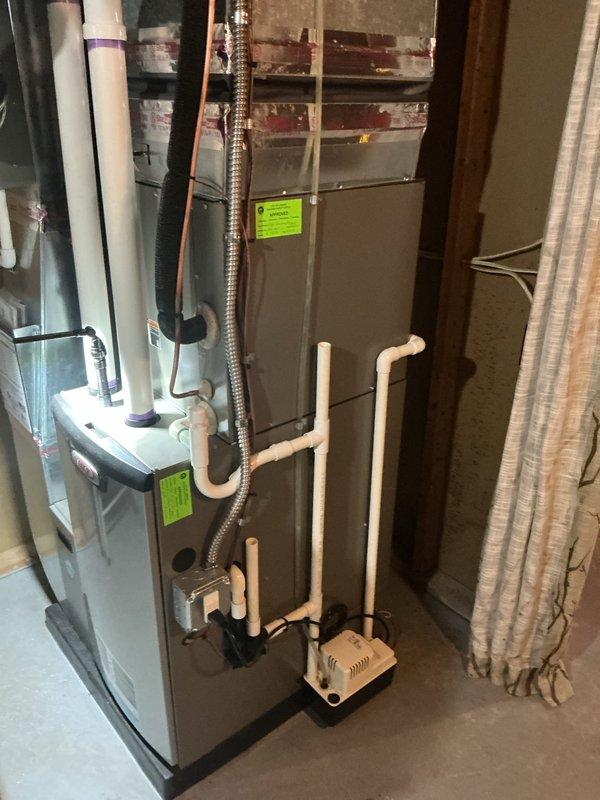 Completed routine HVAC maintenance on residential air handler and furnace system, including inspection of condensate pump, drain lines, and all PVC drainage components. All equipment operating within normal parameters, ductwork connections secure, and condensate drainage system functioning properly with no blockages detected.