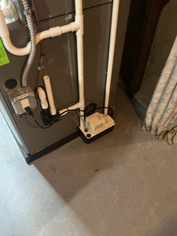 Completed routine HVAC maintenance on residential air handler and furnace system, including inspection of condensate pump, drain lines, and all PVC drainage components. All equipment operating within normal parameters, ductwork connections secure, and condensate drainage system functioning properly with no blockages detected.