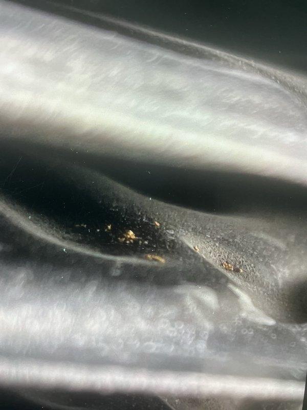 Responded to no heat call at residential property. Upon inspection of furnace located in utility room, discovered electrical wiring issues within the blower compartment and significant debris accumulation on heat exchanger tubes. Inspected all electrical connections, terminal blocks, and capacitor assembly. Documented condition of internal components showing signs of age and operational wear. Cleaned debris from heat exchanger surfaces and verified proper wire routing and connections throughout electrical compartment. System evaluated for safety and operational concerns.