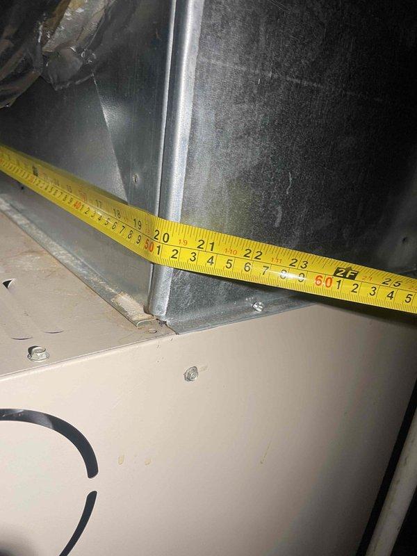 Responded to commercial heating outage reported as non-operational for one week. Conducted onsite assessment to locate and evaluate existing furnace system, which was determined to be in basement location rather than rooftop installation. Performed measurements of existing HVAC ductwork and air handler unit to prepare full system replacement estimate. Documented current equipment configuration including furnace dimensions, ductwork connections, and PVC condensate piping with shut-off valves for proper system sizing and replacement specifications.