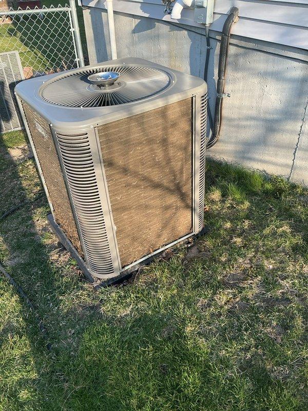 Completed comprehensive AHC maintenance on heating and cooling systems. Inspected outdoor condensing unit, which showed significant accumulation of dirt, dust, and debris on exterior surfaces and louvers requiring attention. Replaced air filters and evaporative cooler pads as needed to maintain optimal system performance and airflow efficiency.