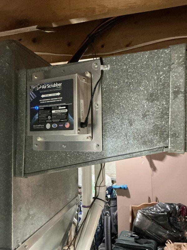 Performed comprehensive annual maintenance on residential central air conditioning system and Bryant furnace. Inspected and verified proper operation of Air Scrubber air purification unit mounted to supply ductwork in attic space. Conducted complete system evaluation including refrigerant levels, electrical connections, condensate drainage, and airflow measurements. Cleaned condenser coils, checked thermostat calibration, and verified all safety controls functioning properly. System operating within manufacturer specifications with no immediate repairs required at this time.