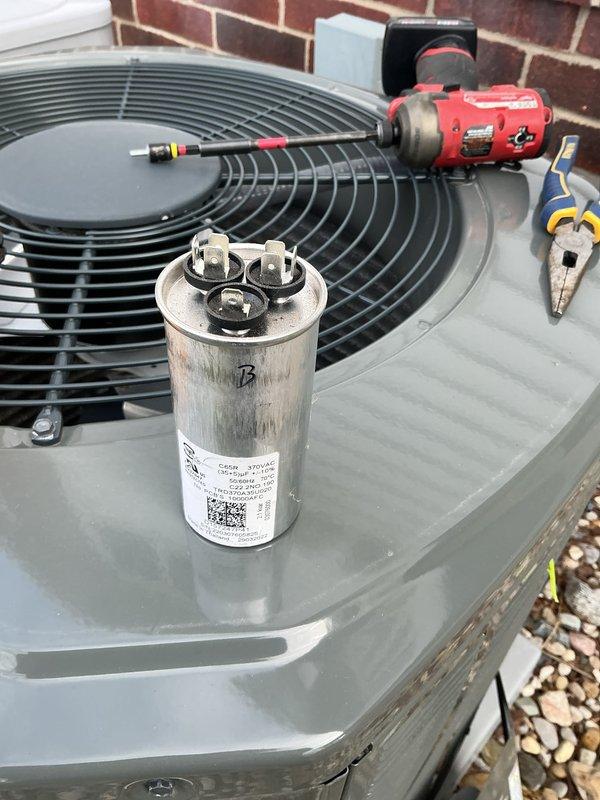 Completed annual cooling maintenance on residential HVAC system. Performed comprehensive inspection of outdoor condenser unit and indoor air handler components, including examination of refrigerant lines, dual-run capacitor, compressor motor, and filtration system. All components found to be operational with normal wear patterns, copper lines showing typical patina, and capacitor functioning within specifications. System tested and verified for proper operation with no deficiencies noted.