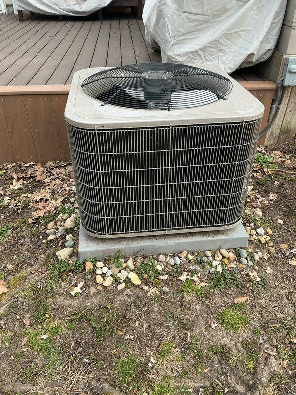 Completed scheduled Air Care Maintenance on residential split HVAC system. Inspected outdoor condenser unit on concrete pad, verified proper airflow through louvered panels and protective grille, and assessed overall equipment condition. Performed indoor inspection of furnace and air handler in basement utility area, checked ductwork connections, condensate drainage system, and electrical components to ensure system readiness for cooling season.