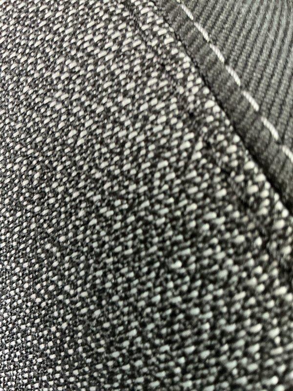 Completed annual cooling maintenance service on HVAC system. Inspected air handler unit and blower access components, verified proper operation of all mechanical equipment. Documented system identification labels and part numbers for service records. Evaluated filter and evaporator pad condition as part of routine preventative maintenance protocol. All components found in satisfactory working order with no immediate service needs identified.