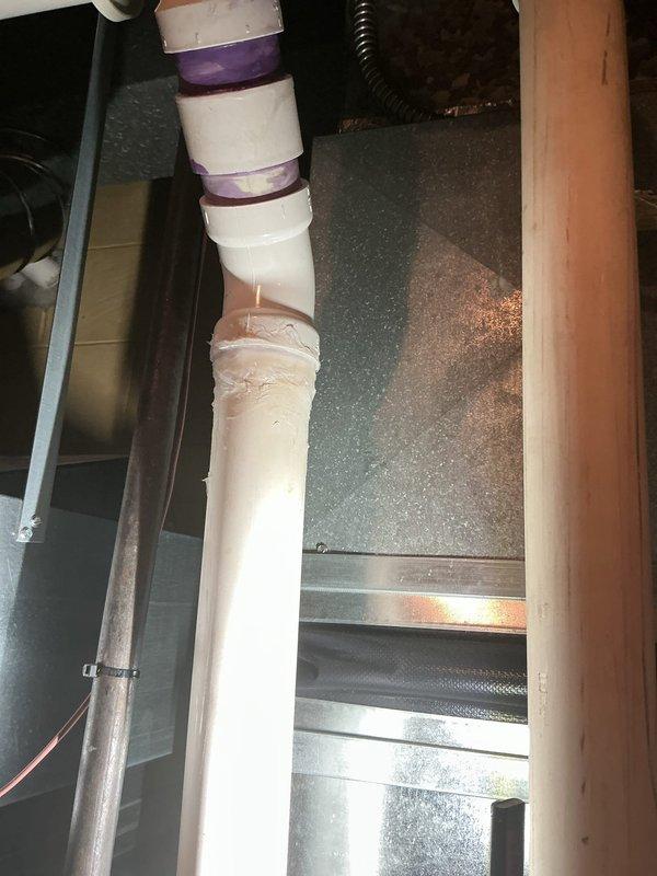 Completed annual HVAC maintenance inspection in apartment unit. Inspected condensate pump system, associated PVC drainage piping, and ductwork components in basement mechanical space. Verified proper operation of condensate removal system, checked all pipe connections and mounting hardware for secure installation, and confirmed drainage lines were clear and functioning correctly.