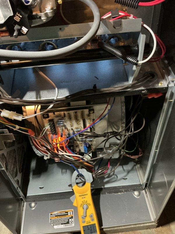 Completed annual heating maintenance on residential HVAC system. Performed comprehensive inspection of furnace components including control board, electrical connections, and gas valve assembly. Tested system operation with diagnostic equipment, verified proper voltage and amperage readings at terminal connections, and confirmed all safety controls functioning within manufacturer specifications. All wiring connections secure, heat exchanger visually inspected with no signs of cracks or deterioration, and blower assembly operating smoothly. System tested under full heating load with satisfactory performance.