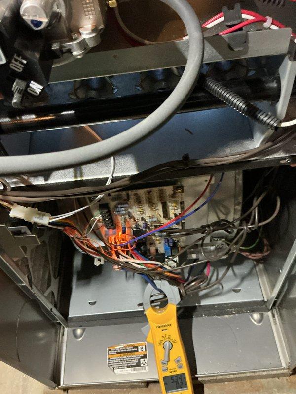 Completed annual heating maintenance on residential HVAC system. Performed comprehensive inspection of furnace components including control board, electrical connections, and gas valve assembly. Tested system operation with diagnostic equipment, verified proper voltage and amperage readings at terminal connections, and confirmed all safety controls functioning within manufacturer specifications. All wiring connections secure, heat exchanger visually inspected with no signs of cracks or deterioration, and blower assembly operating smoothly. System tested under full heating load with satisfactory performance.