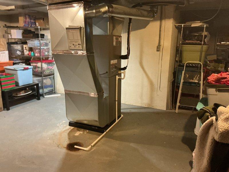 Completed full HVAC system installation in basement mechanical room, including new furnace and air conditioning unit. Installed all necessary ductwork connections, refrigerant lines, condensate drainage, and electrical connections per manufacturer specifications. System was tested for proper operation, permits were obtained, and all required documentation including energy rebate paperwork and financing forms were processed and submitted.