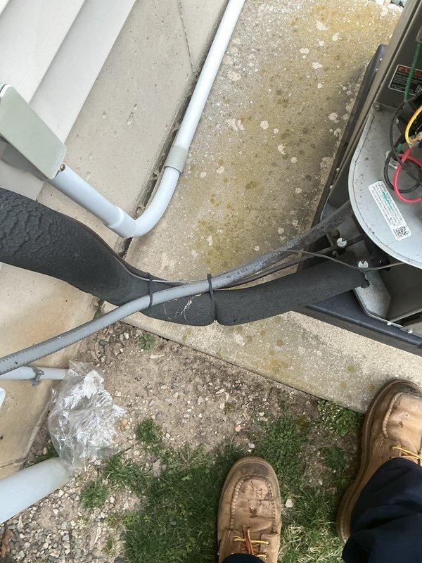 Completed comprehensive ComfortGuard maintenance visit on residential outdoor HVAC system. Performed thorough inspection of condenser unit, including examination of capacitor with visible terminals and connections, verified proper electrical conduit routing, and assessed PVC condensate line installation. Unit components showed normal wear consistent with regular operation, all electrical connections secure, and system operating within manufacturer specifications.