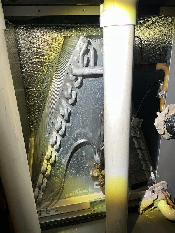 Completed annual cooling maintenance on residential HVAC system. Performed comprehensive inspection of evaporator coil, air handler unit, and refrigerant lines in mechanical closet. All components found operating within normal parameters with no deficiencies noted. System tested and confirmed ready for cooling season.