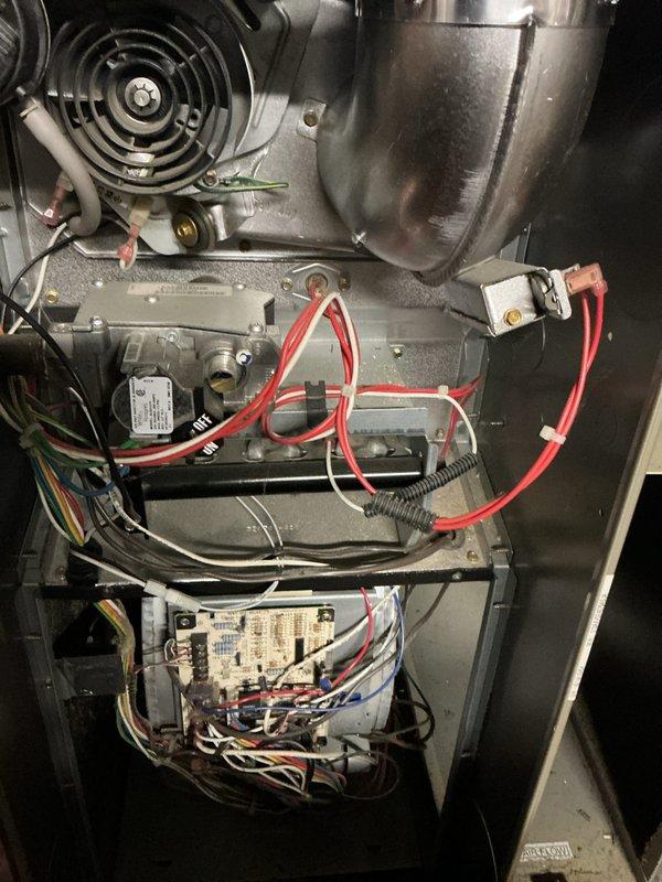 Completed comprehensive preventive maintenance inspection on gas furnace system. Verified proper ignition and burner operation with all burners displaying appropriate blue flame patterns, inspected heat exchanger for integrity, tested blower motor assembly functionality, and examined all electrical connections and control board components for secure operation. Unit operational and performing within manufacturer specifications upon completion of maintenance service.