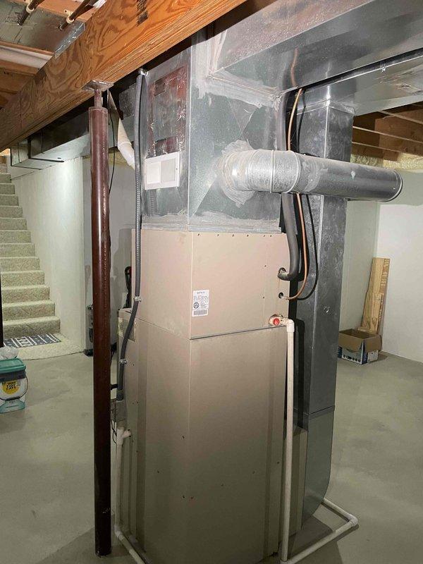 Provided estimate for furnace replacement in basement location. Current 30+ year old unit is operational but has exceeded expected service life. Assessed existing HVAC system including furnace, ductwork configuration, electrical connections, and surrounding installation space to determine replacement specifications and requirements.