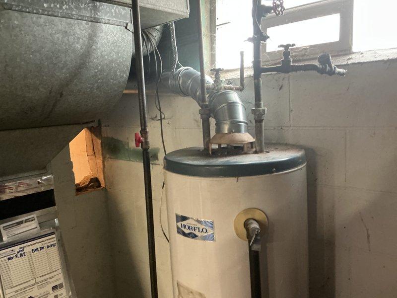 Completed full HVAC system installation including a 70,000 BTU gas furnace and 2.5 ton air conditioning unit. Installed new chimney liner for proper venting of the heating system and reconnected all necessary utilities. All required mechanical permits were obtained prior to installation, and the system was tested and operational upon completion.