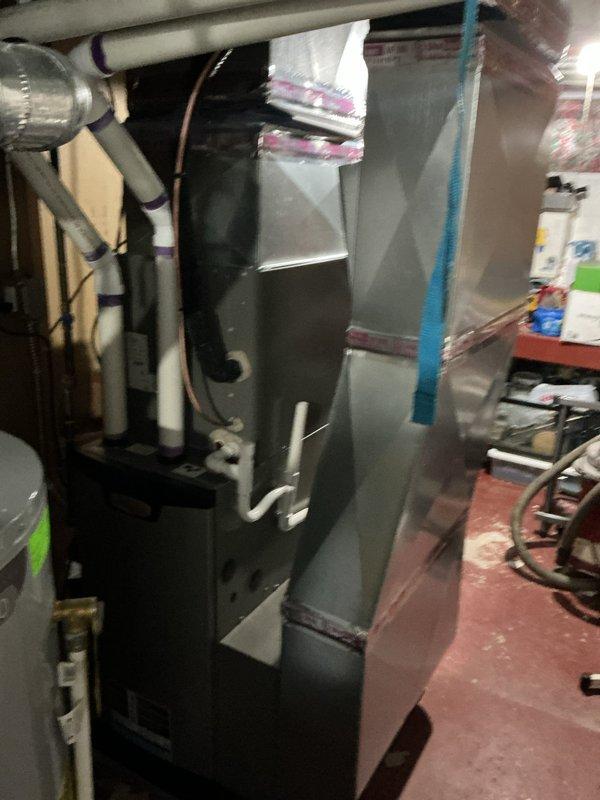 Completed annual furnace maintenance and tune-up on gas-fired forced air heating system. Performed comprehensive inspection of blower motor assembly, heat exchanger, electrical connections, and control boards. Verified all safety controls operational, checked airflow, and confirmed system operating within manufacturer specifications with no deficiencies noted.