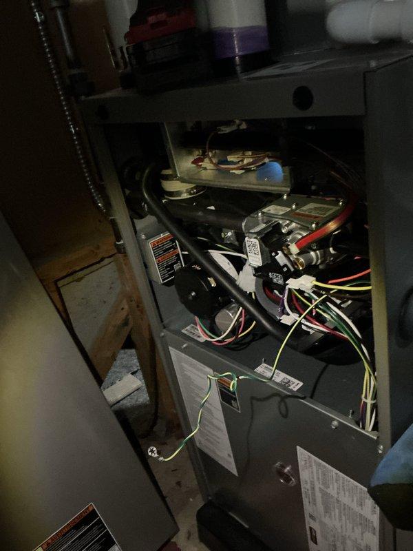 Completed annual furnace maintenance and tune-up on gas-fired forced air heating system. Performed comprehensive inspection of blower motor assembly, heat exchanger, electrical connections, and control boards. Verified all safety controls operational, checked airflow, and confirmed system operating within manufacturer specifications with no deficiencies noted.