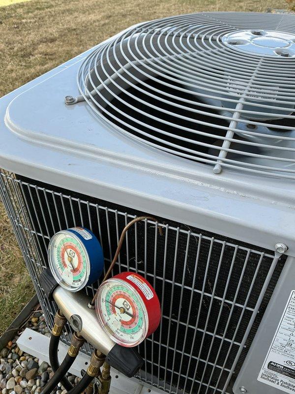 Completed annual cooling maintenance on residential HVAC system. Performed comprehensive inspection of outdoor condensing unit, verified refrigerant pressures using manifold gauges, and inspected Aprilaire indoor air quality equipment. All system components operating within normal parameters with no deficiencies noted.