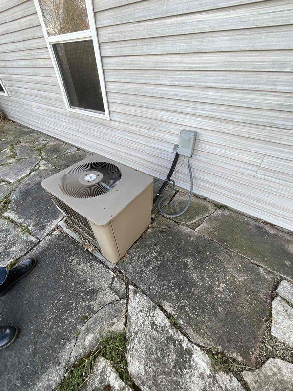 Conducted comprehensive assessment of existing 16-year-old residential air conditioning system original to 2002 construction, evaluating indoor furnace unit in basement and outdoor condensing unit for replacement estimate. Customer reported system has historically underperformed and is seeking replacement within current season. Documented equipment condition, configuration, and installation parameters including ductwork connections, electrical service, refrigerant lines, and condensate drainage for complete system replacement proposal.