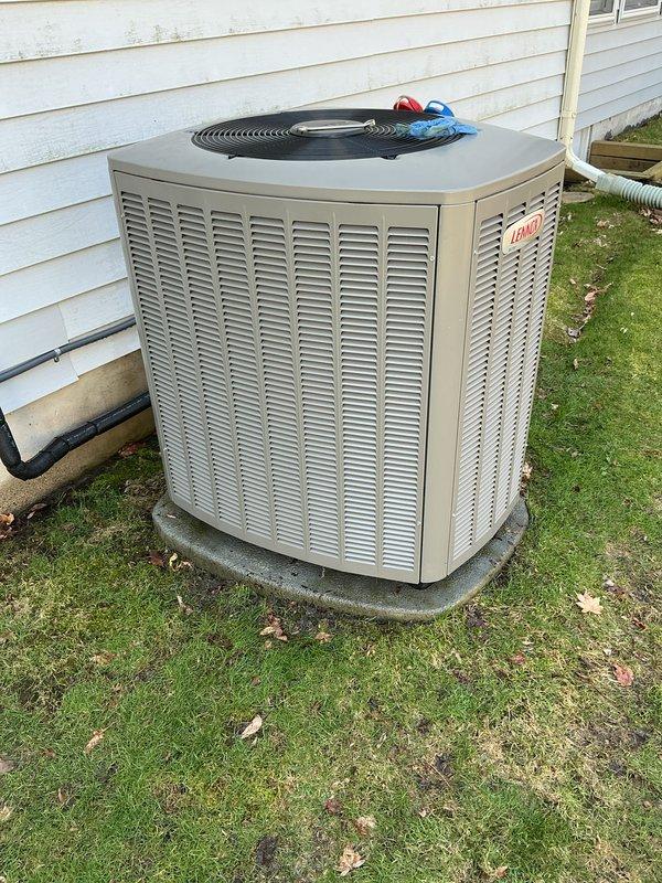 Completed annual cooling maintenance on residential HVAC system. Performed comprehensive inspection of Lennox outdoor condenser unit, checked refrigerant pressures using manifold gauge set, verified proper system operation, and documented equipment condition with photographic records.